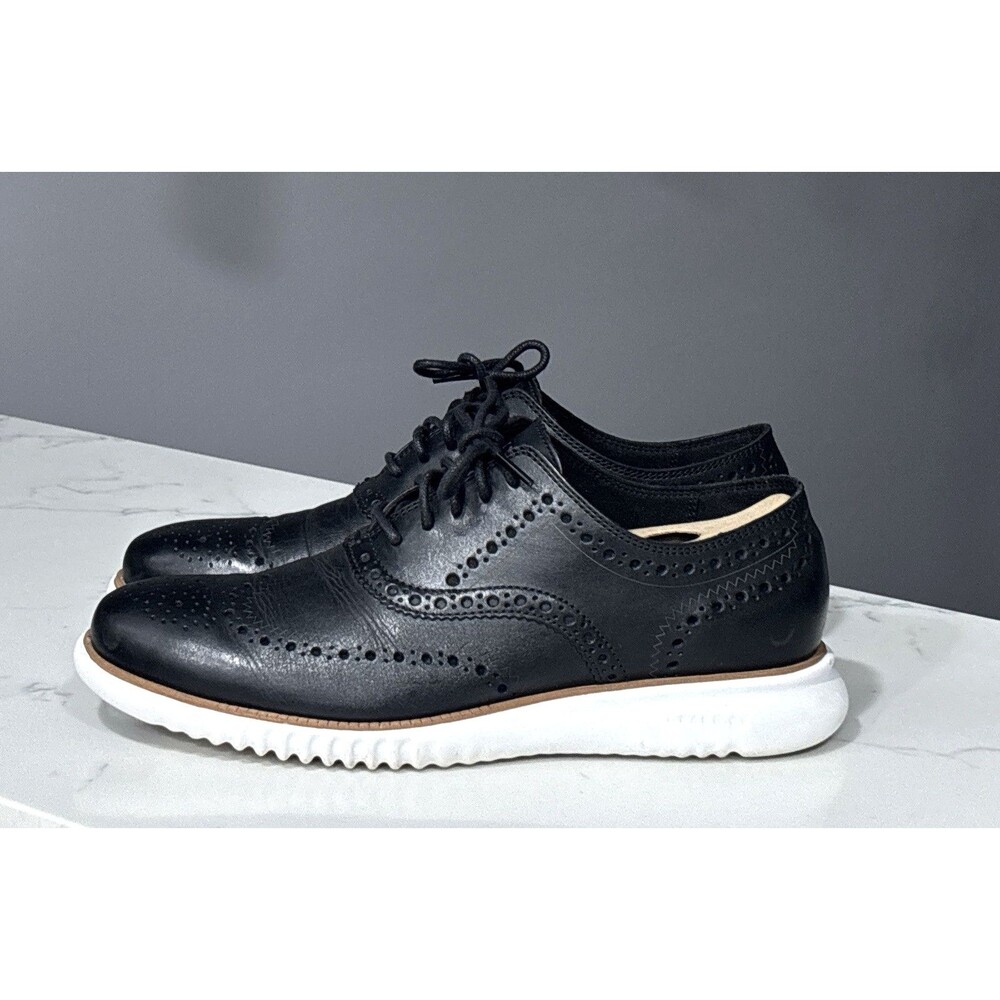 Cole Haan Black Leather Wingtip Sneakers with White Sole